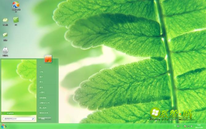 穿透阳光的绿叶win7主题桌面